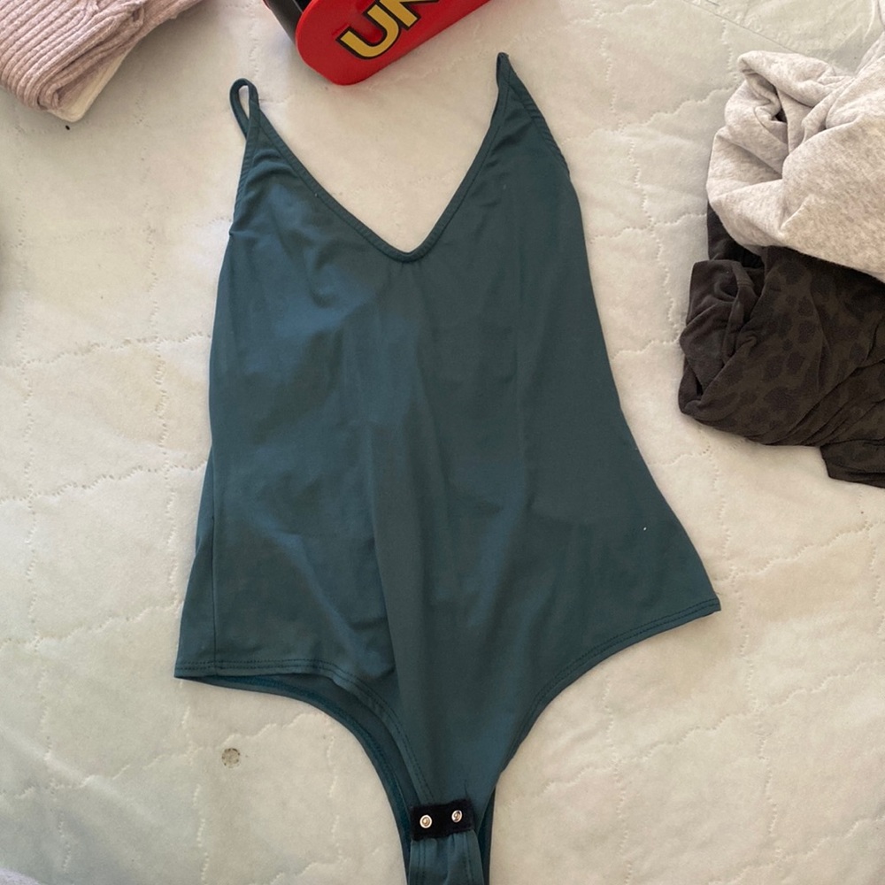 Extra soft bodysuit with snaps. Back design is so cute!